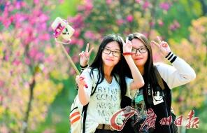 Students take a selfie in the campus of South China Agricultural University.